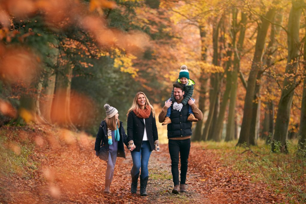 Family walking in autumn