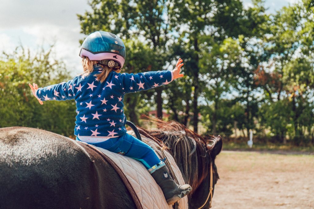 Girl horse riding