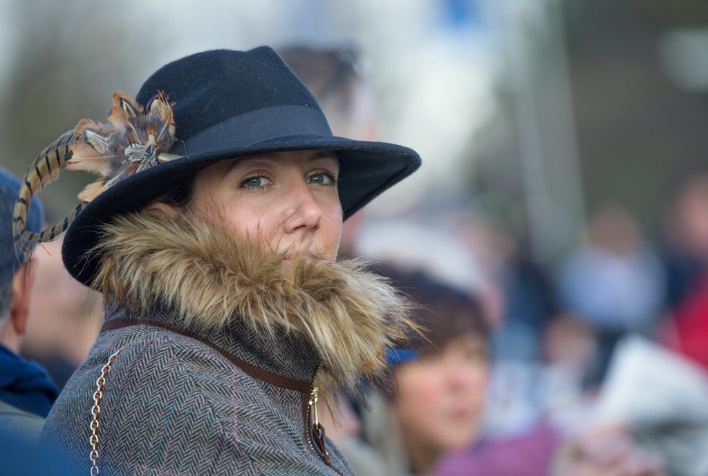 Woman watching horse racing